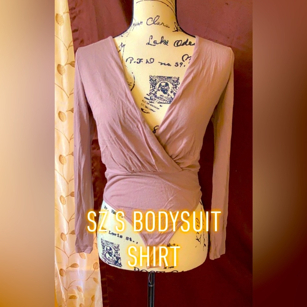 Long sleeve bodysuit top.